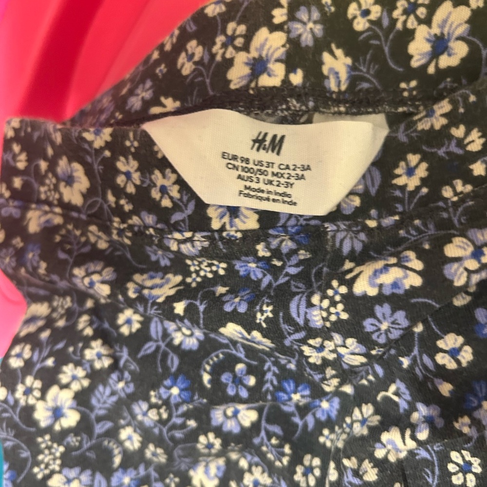 H&M Black Leggings with Blue and White Floral Pattern